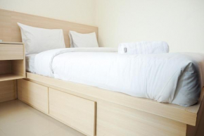Comfort and Cozy 2BR Apartment Parahyangan Residence By Travelio